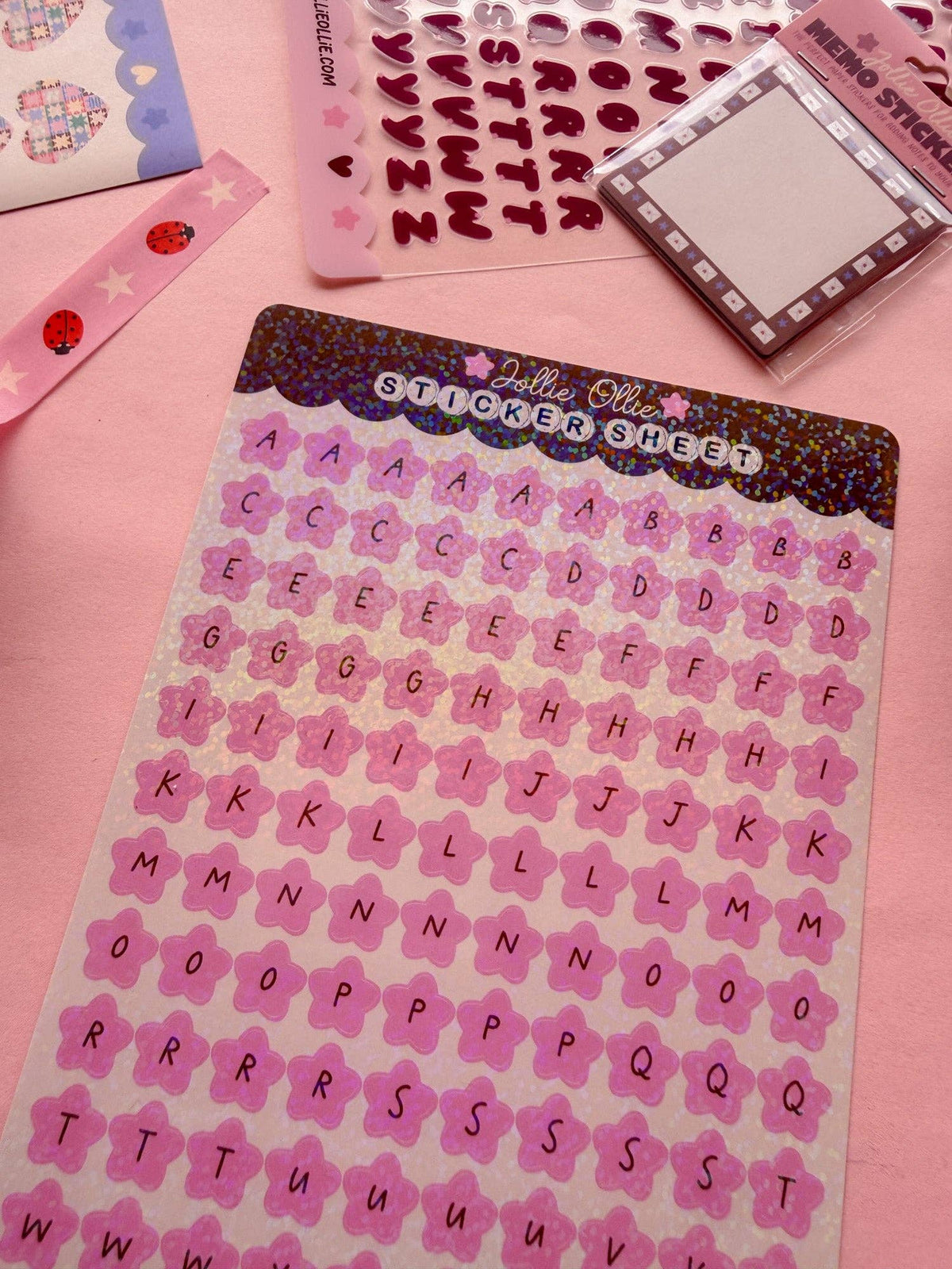 Pink letter sticker sheet with glitter alphabet stickers in rows