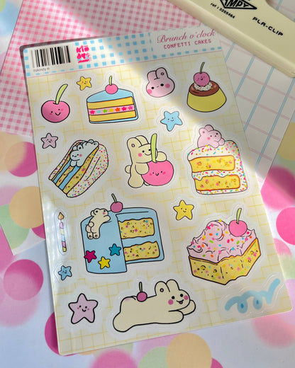 Sticker sheet featuring rabbits, layer cakes, cupcakes, and star decorations