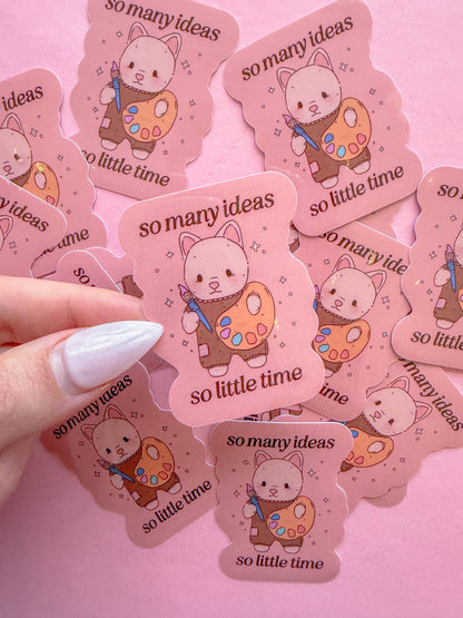 So Many Ideas vinyl stickers: pink cat with art palette, text 'so many ideas' 'so little time'