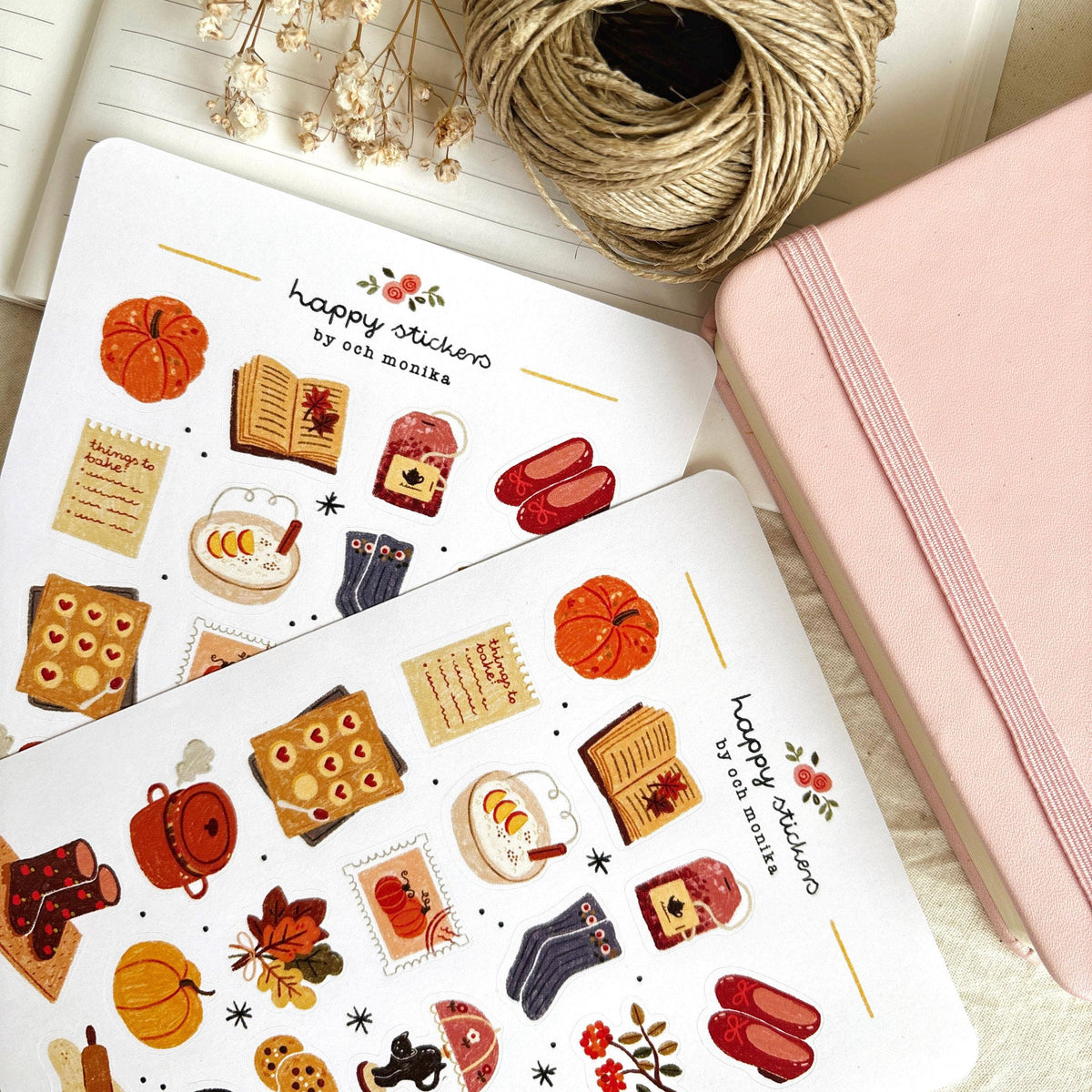 Autumn sticker sheet close-up with pumpkins, boots, books, cookies, and kettle icons on white