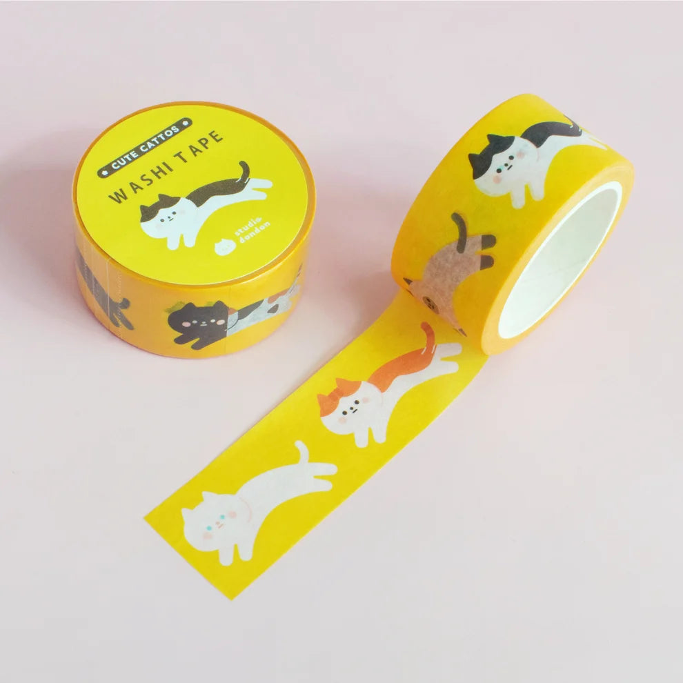 Yellow washi tape strip with cute cat silhouettes and characters