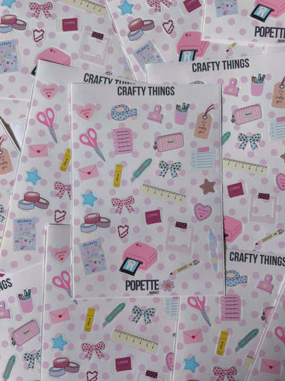Set of A5 sticker sheets overlapping, pastel craft icons on white with pink dots