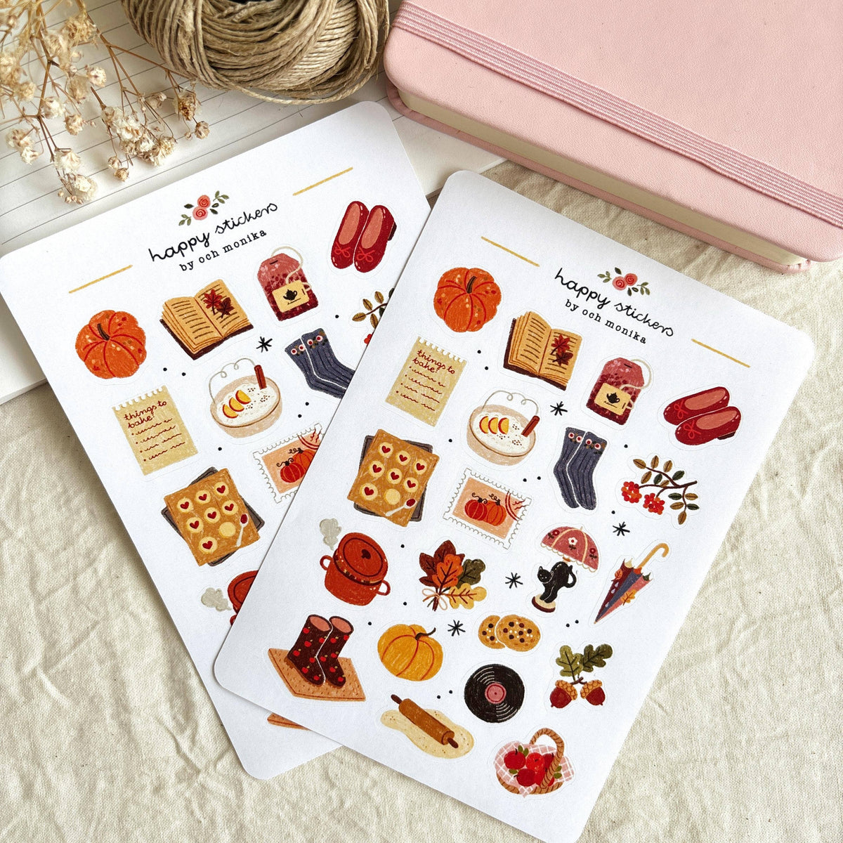 Autumn sticker sheet set with pumpkins, books, gloves, cookies, and kettle icons on white