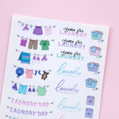 Laundry sticker sheet showing clothesline, laundry day lettering, and washing machine icons