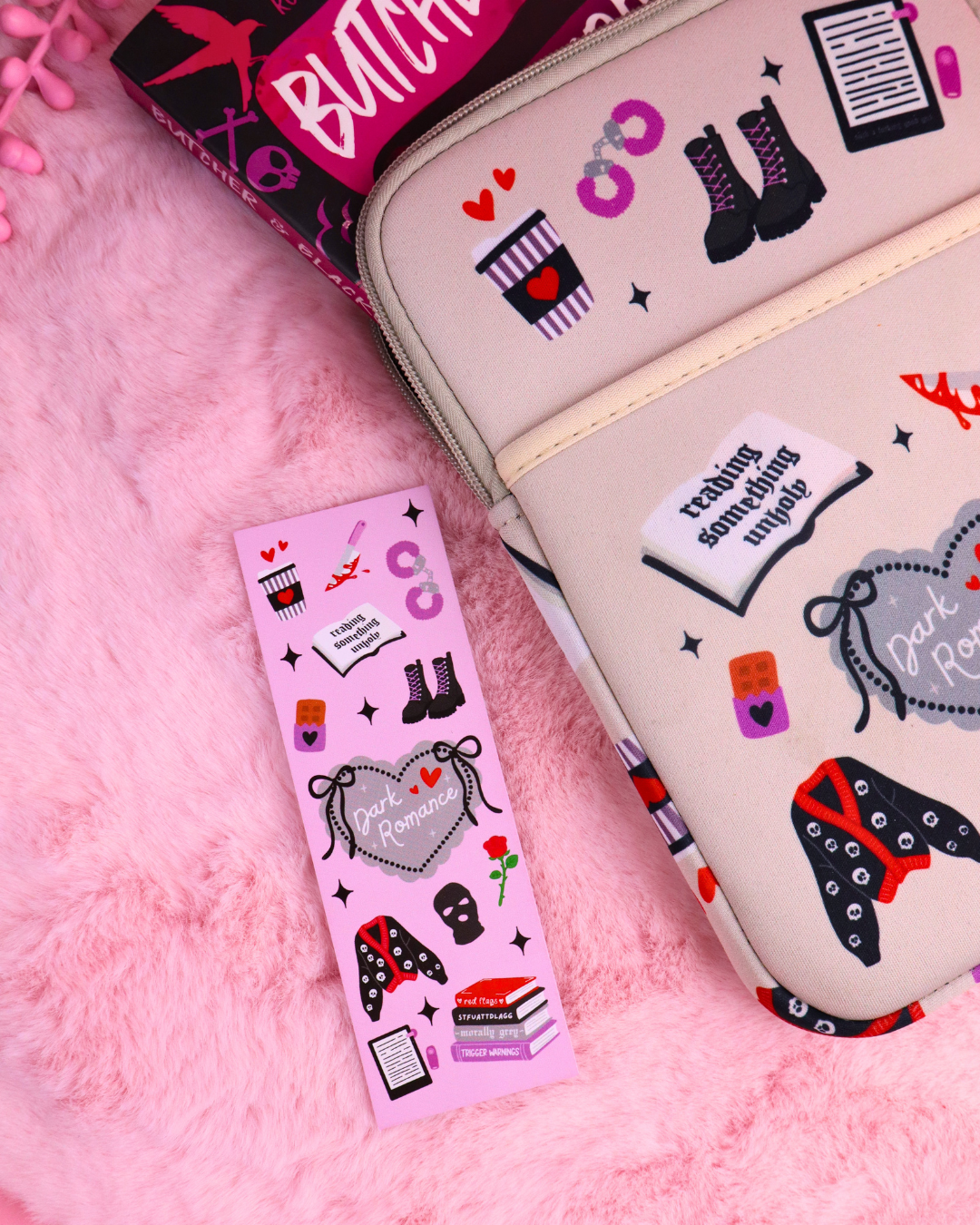 Dark romance bookmark with illustrated heels, dresses, hearts, and quote label