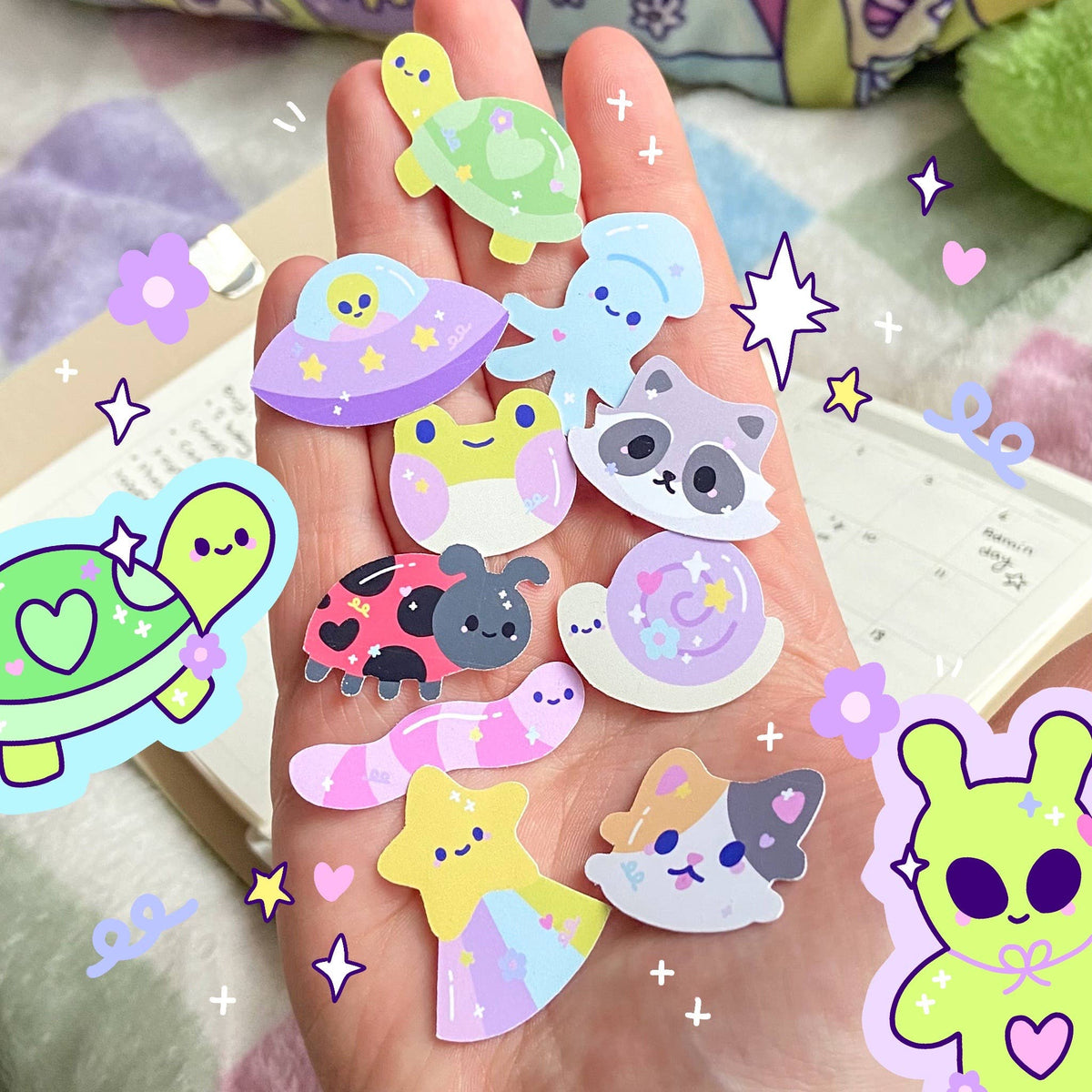 Assorted pastel animal sticker flakes with frogs, panda, cat, and stars