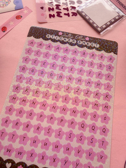 Pink alphabet sticker sheet with sparkly letters in a grid layout