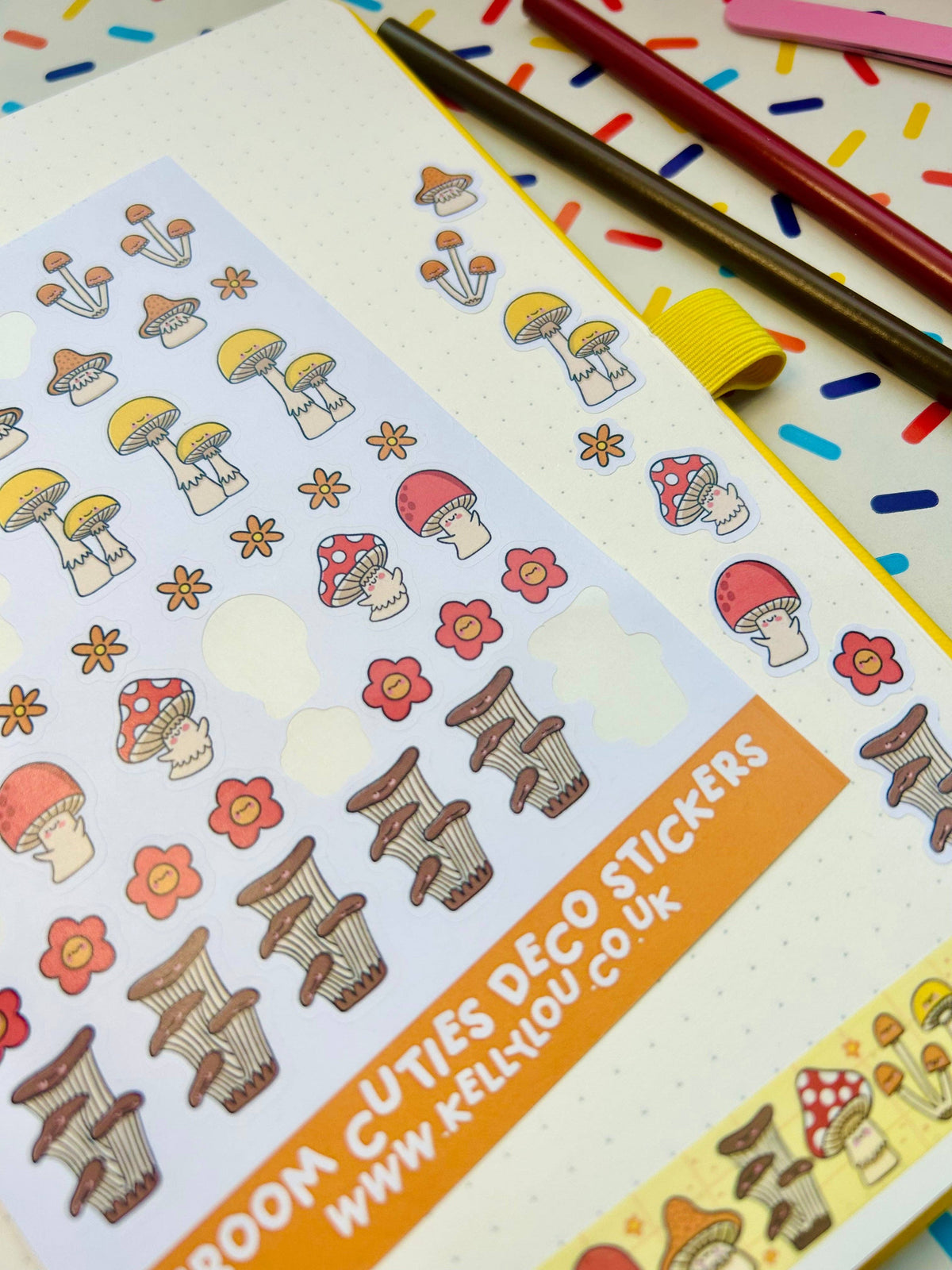 Deco sticker sheet with mushroom and flower stickers and striped brown toadstool designs