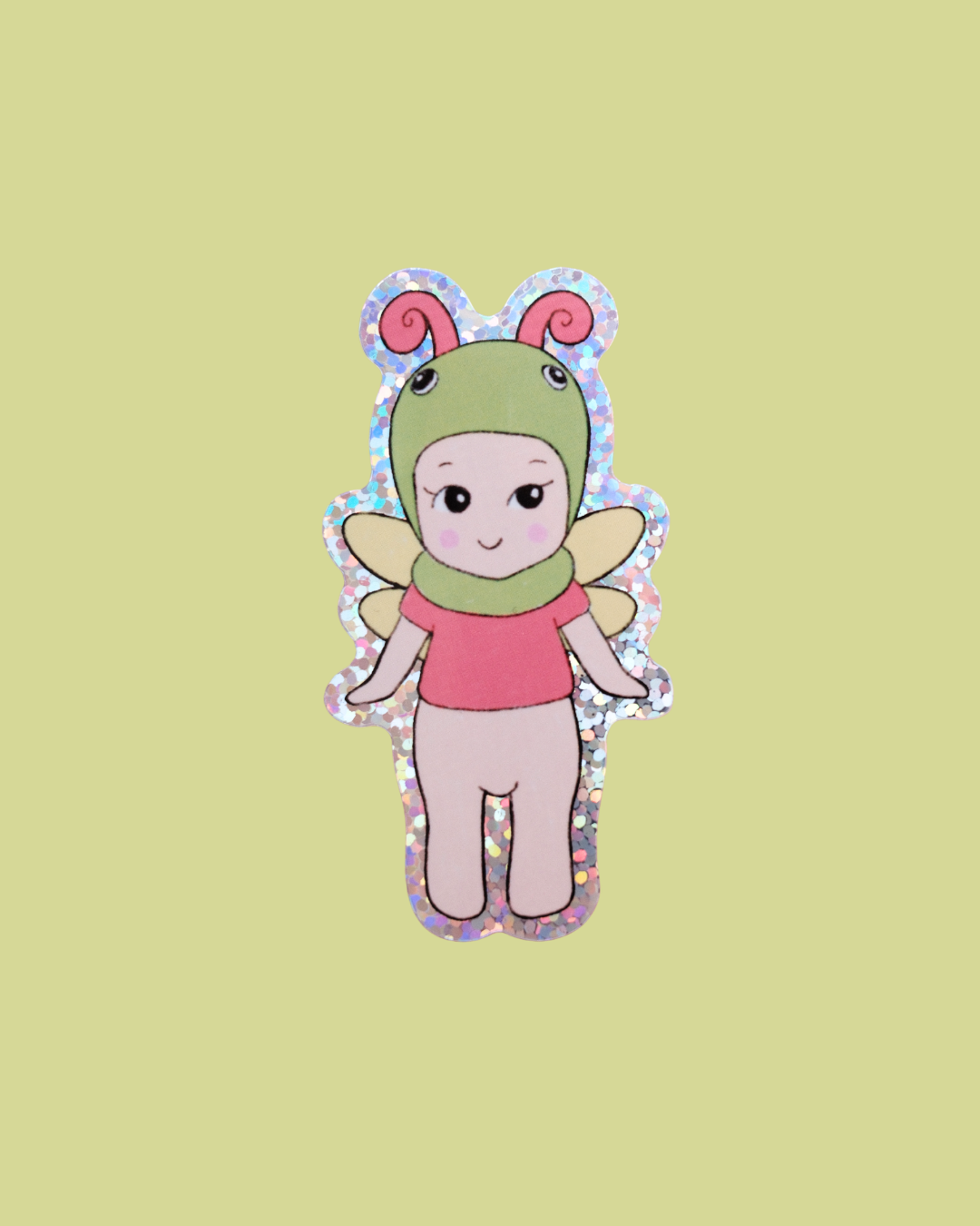 Baby butterfly sticker of a cute green character with pink outfit and wings
