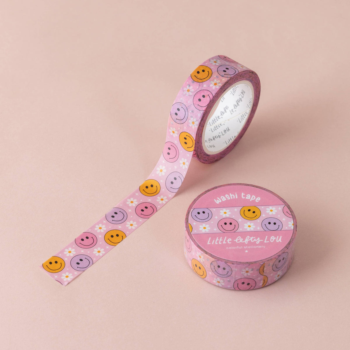 Pastel washi tape roll and strip with pink, purple, yellow smiley faces