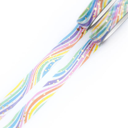 Washi tape strip with pastel rainbow stripes and star confetti, single roll end