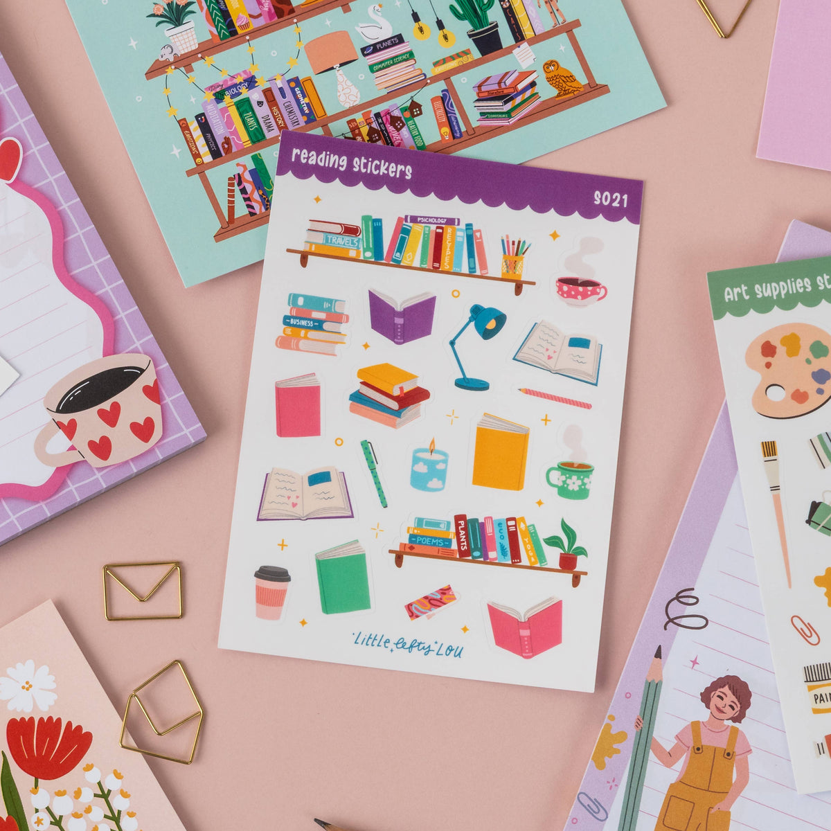 A6 reading sticker sheet with books, desk items, bookmarks, and writing tools