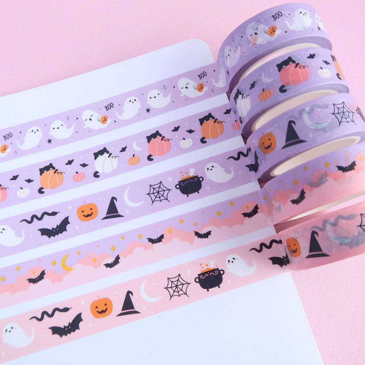 Close-up washi tape with sneaky cats, pumpkins, bats, ghosts, and moons