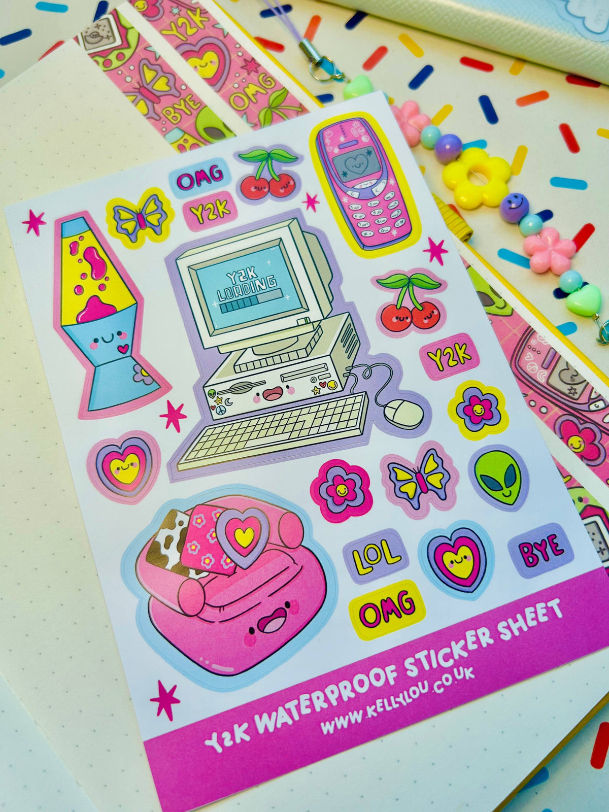 Vinyl sticker sheet with computer, phone, alien, cherries, hearts, flowers, LOL/OMG/BYE