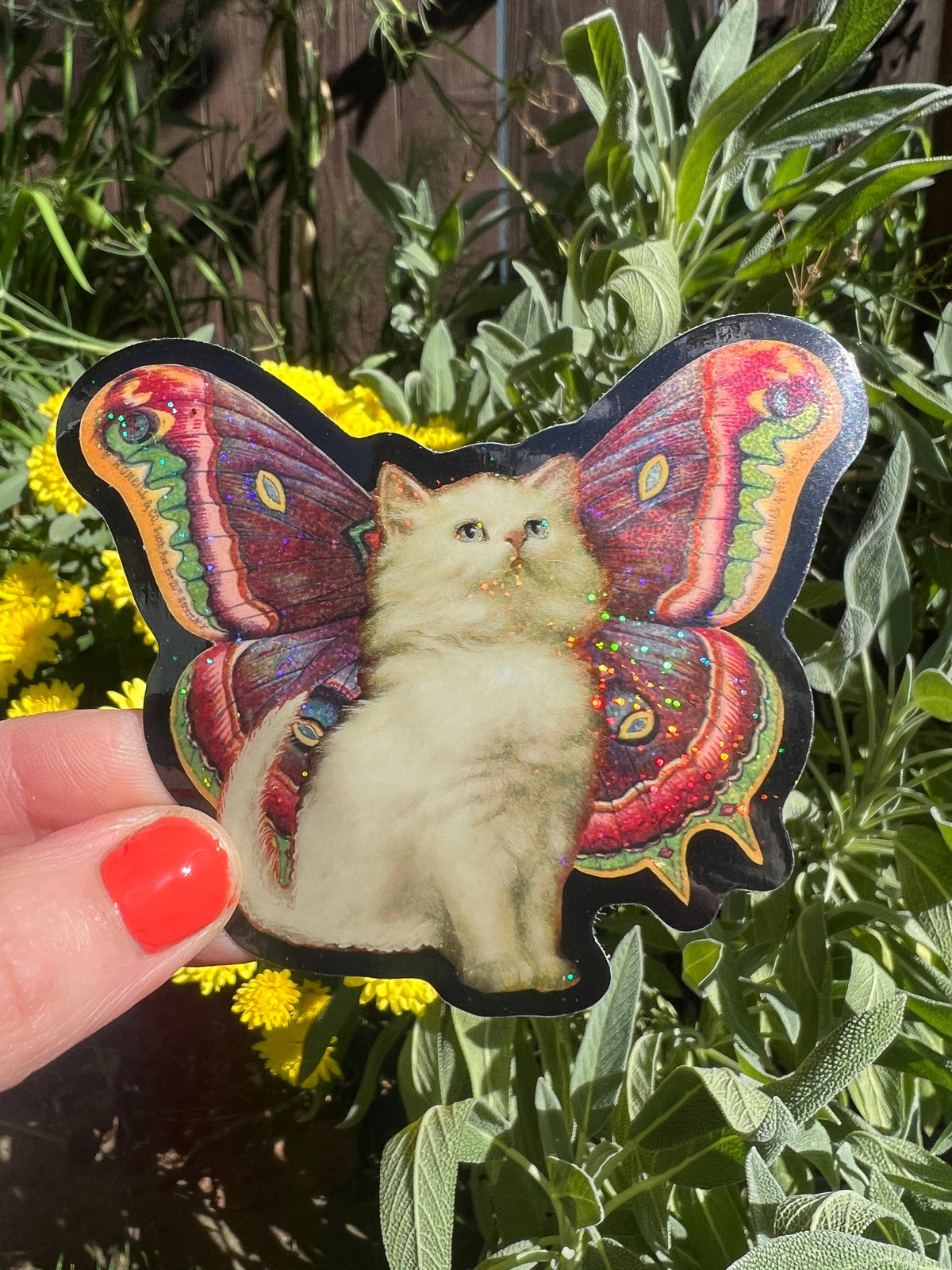 Cat butterfly glitter sticker with kitten centered and large colorful iridescent wings