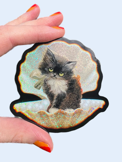 3-inch tuxedo cat in seashell sticker with glittery iridescent edges