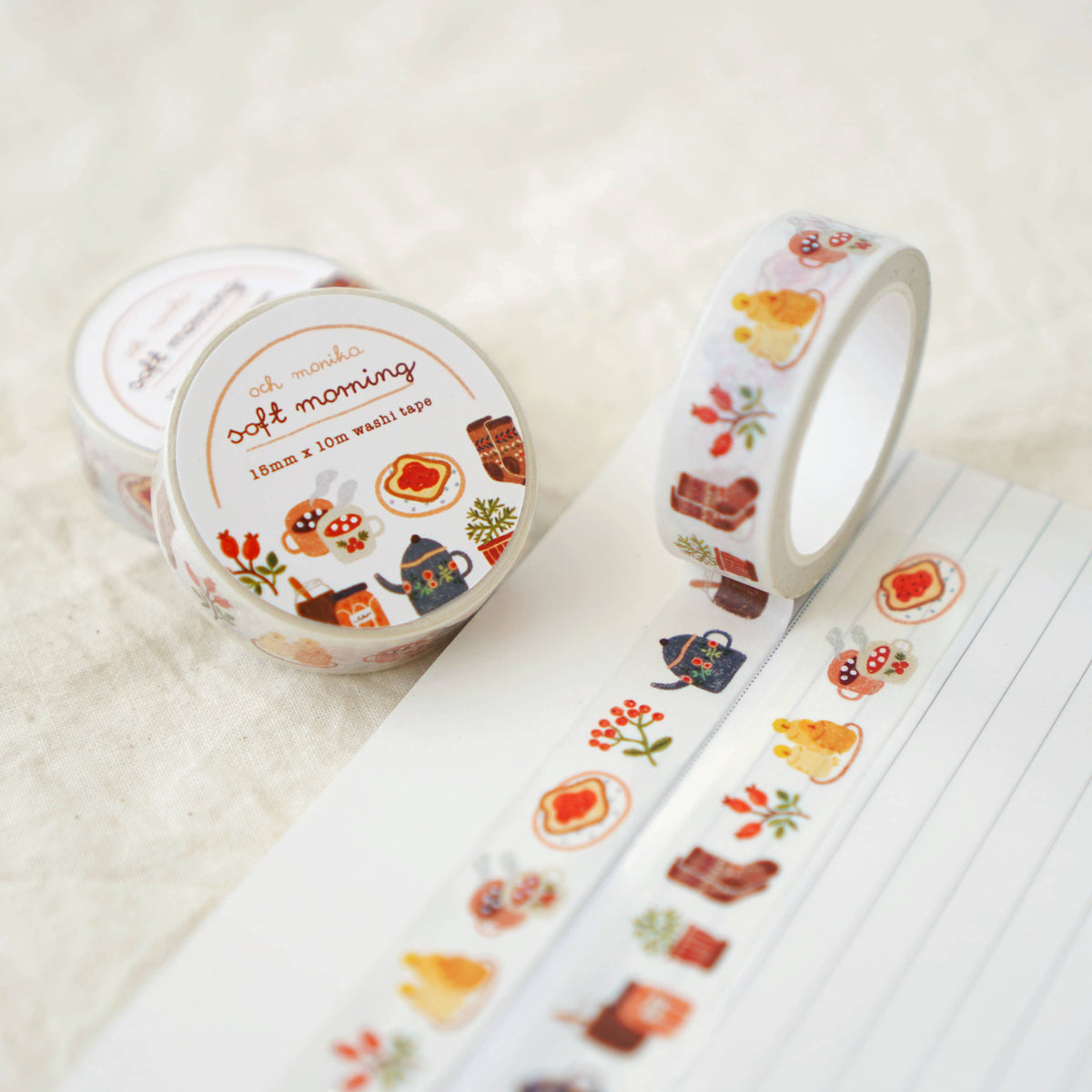 Decorative washi tape roll set with cute breakfast illustration pattern on a pale white base