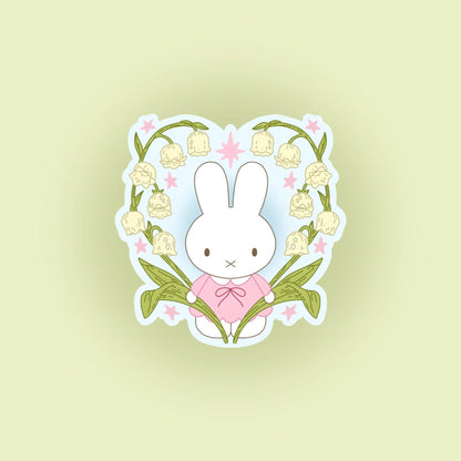 Bunny flower sticker with pale blue bunny wearing a pink bow and pastel doodles
