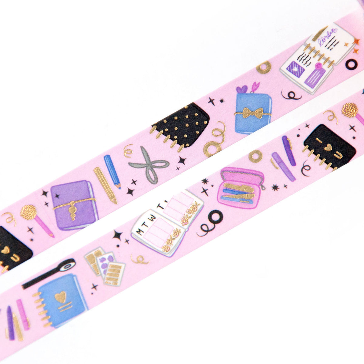 Washi tape strip with stationery icons in purple, blue, and gold tones