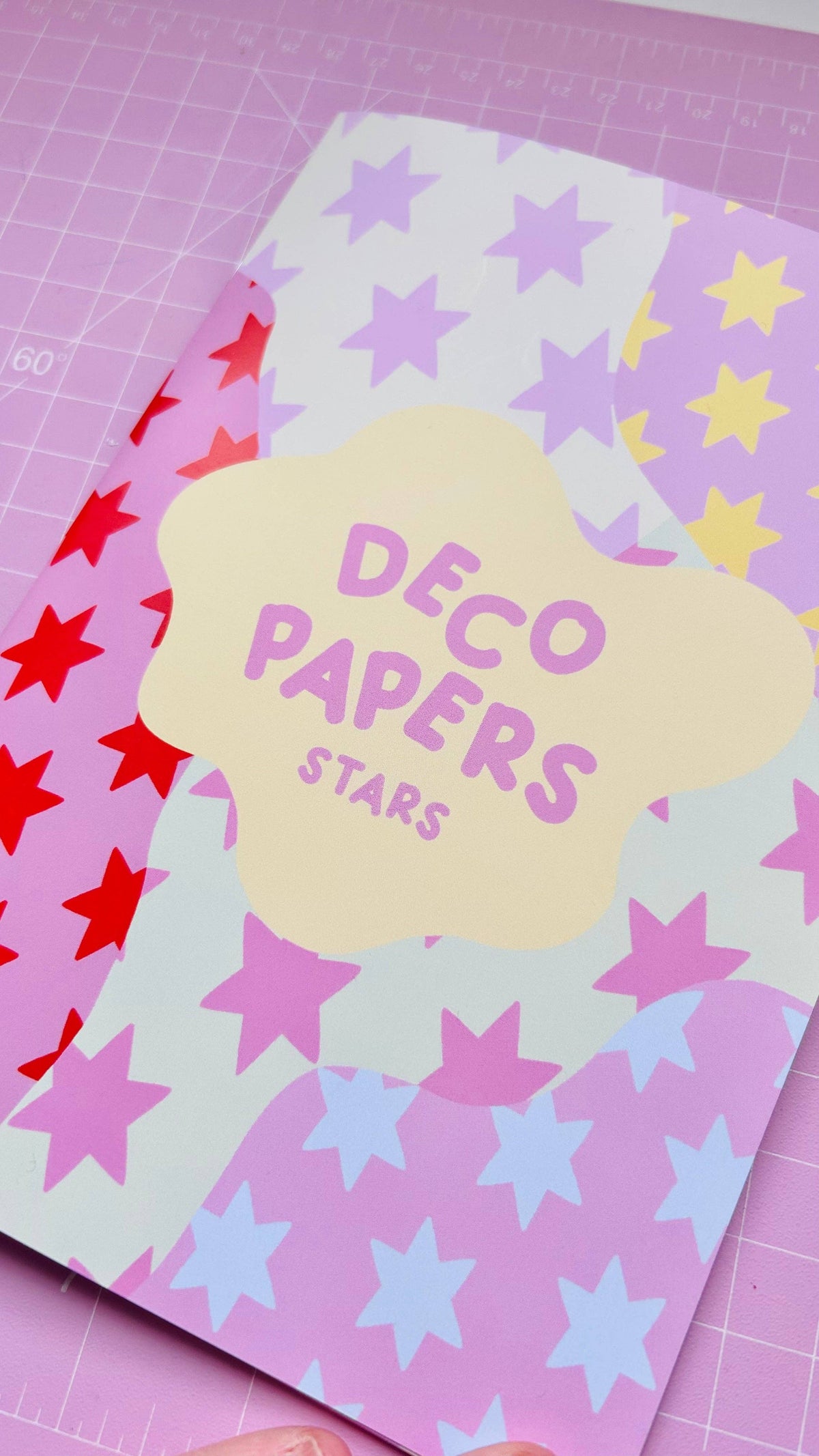 A5 deco papers book, starry cover with “DECO PAPERS STARS” cloud label; purple, red, yellow stars