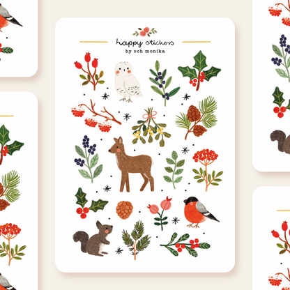 Winter nature sticker sheet with fox, owl, robin, deer, holly, pine, and berries