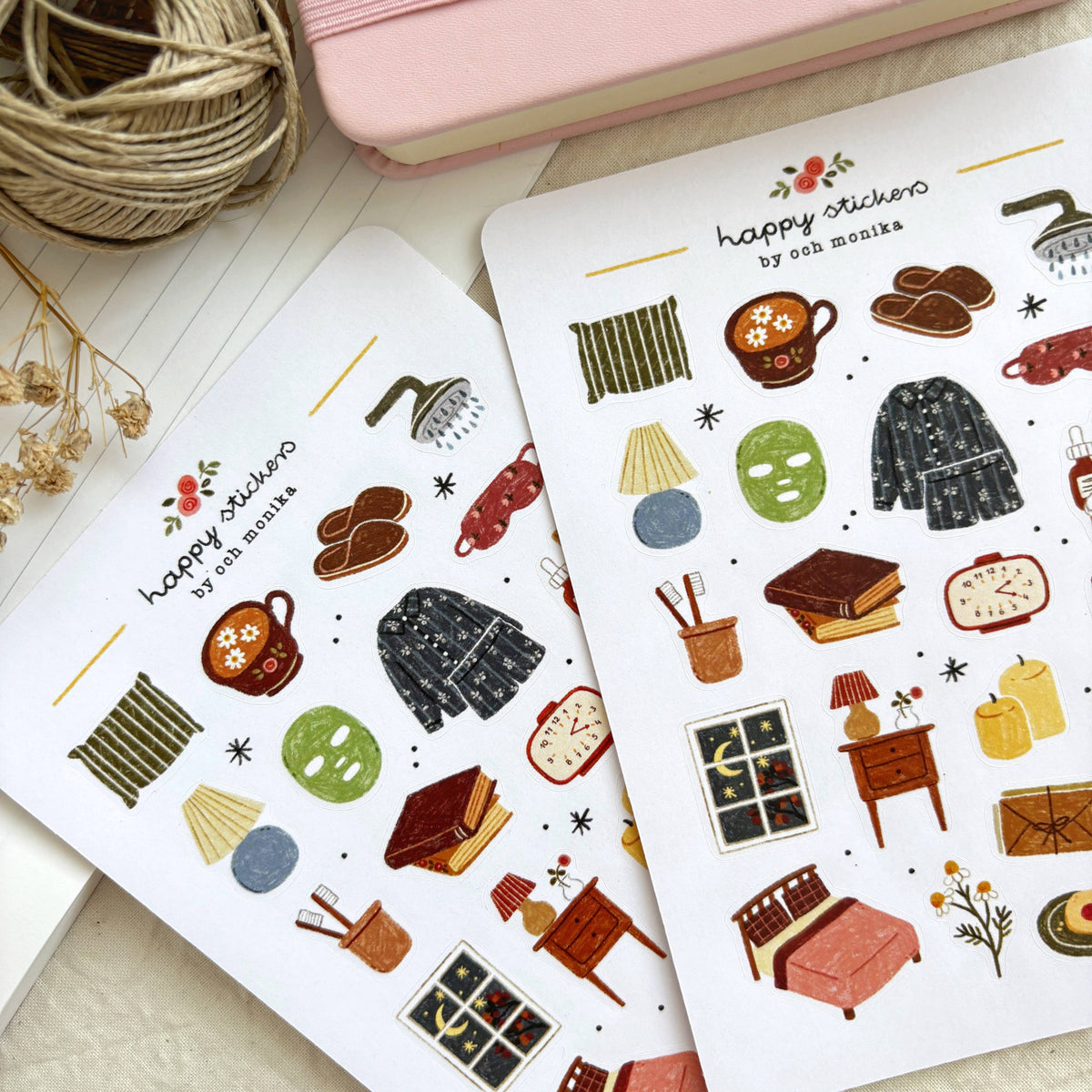 Bedtime sticker sheets close-up with pajamas, teapot, nightstand, and slippers