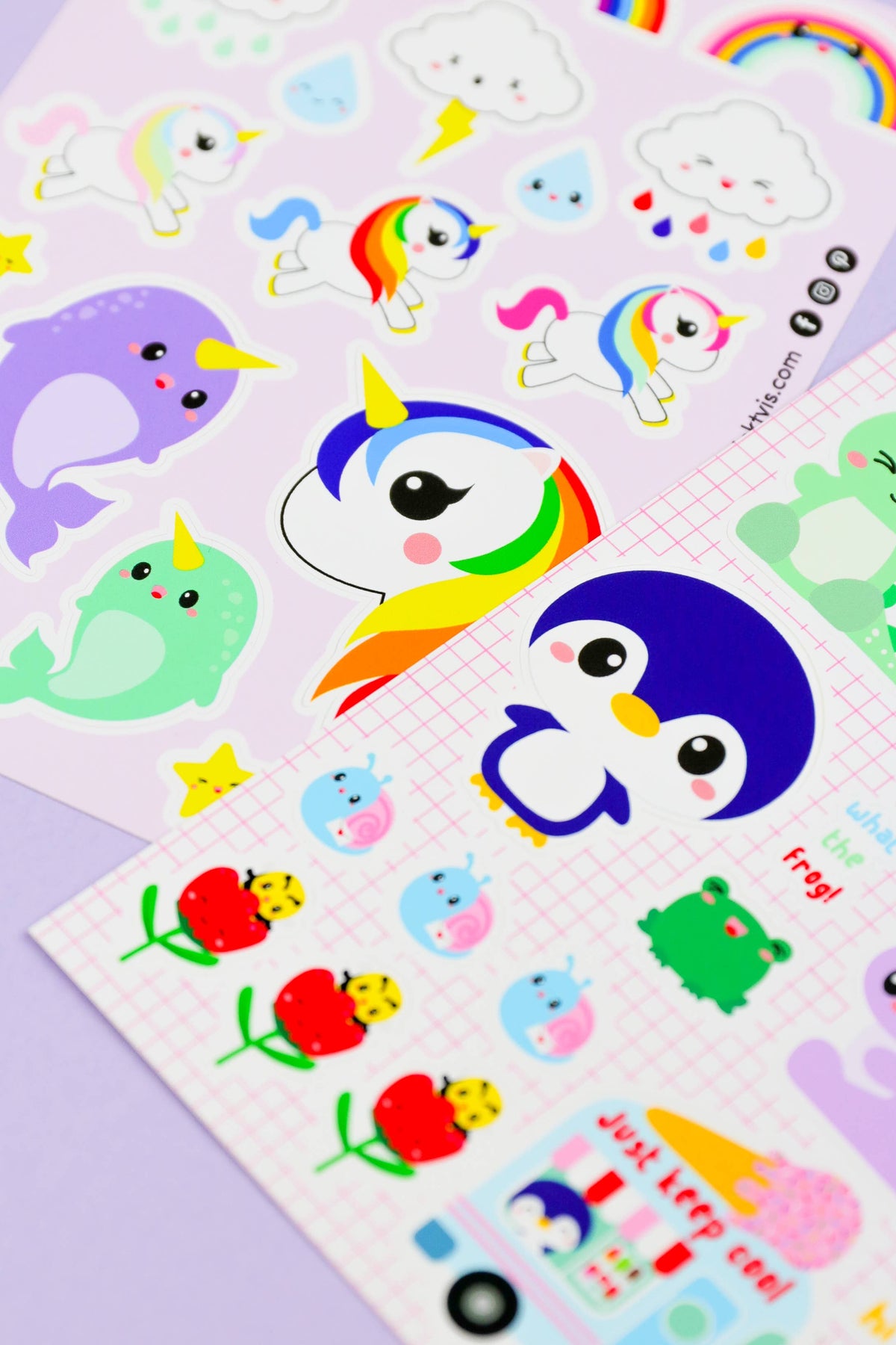 Sticker sheet section with narwhal, rainbow, clouds, stars, and cute sea creature icons