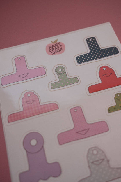 Board clamps sticker sheet close-up of colorful T-shaped clamp pieces