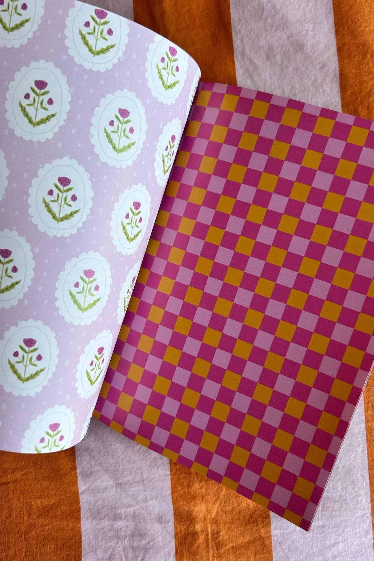 A5 scrapbook paper sheet with lilac leaf medallions and orange purple checkered pattern