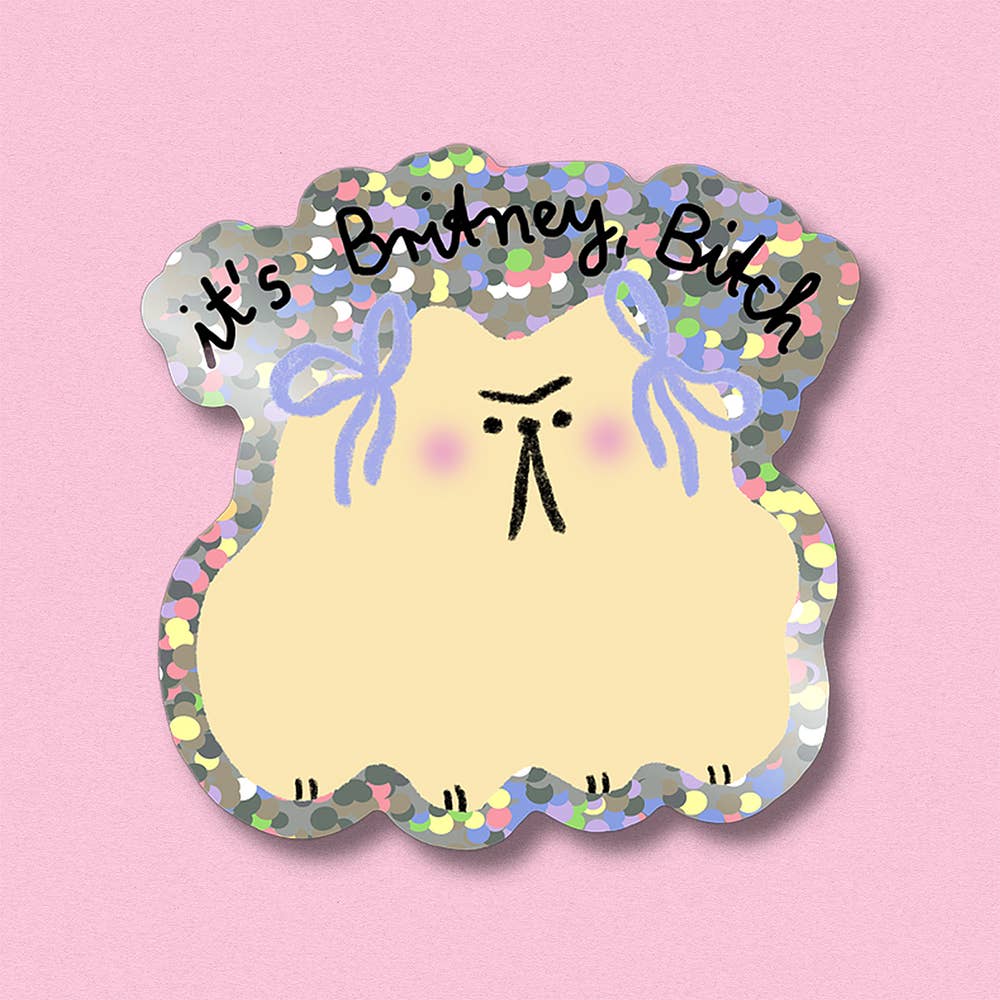 Glitter sticker, cloud-shaped yellow face with rainbow sequins, bows, and 'It's Britney Bitch' text