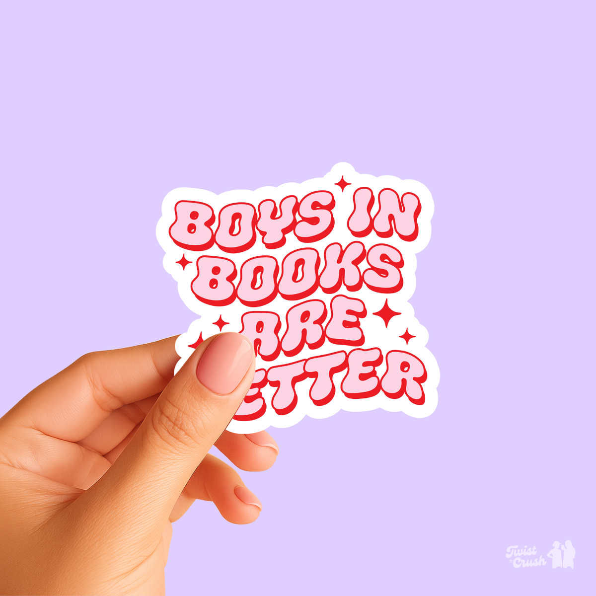 Red and white typography sticker, held in a hand