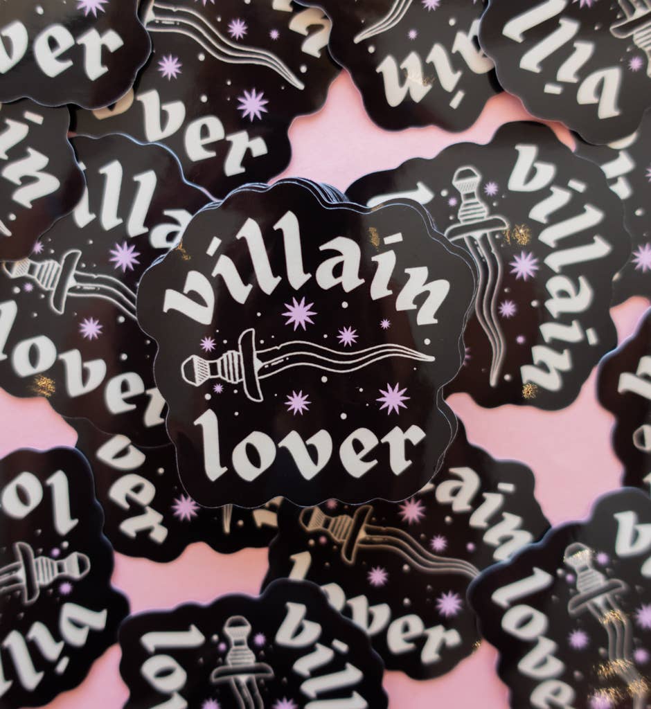 Vinyl sticker with “Villain Lover” lettering, guitar graphic, and sparkles