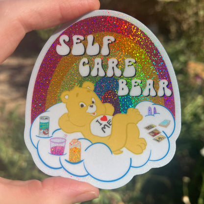 3-inch Self Care Bear glitter sticker, bear holding heart on cloud with rainbow border