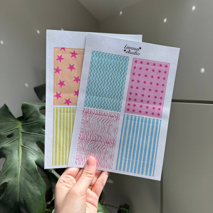 Polaroid frame sheets held in hand, showing teal wavy, pink star, zebra, and striped borders