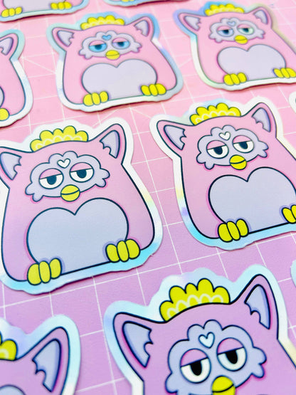 Sheet of holographic Furby cat stickers with purple outlines and yellow details
