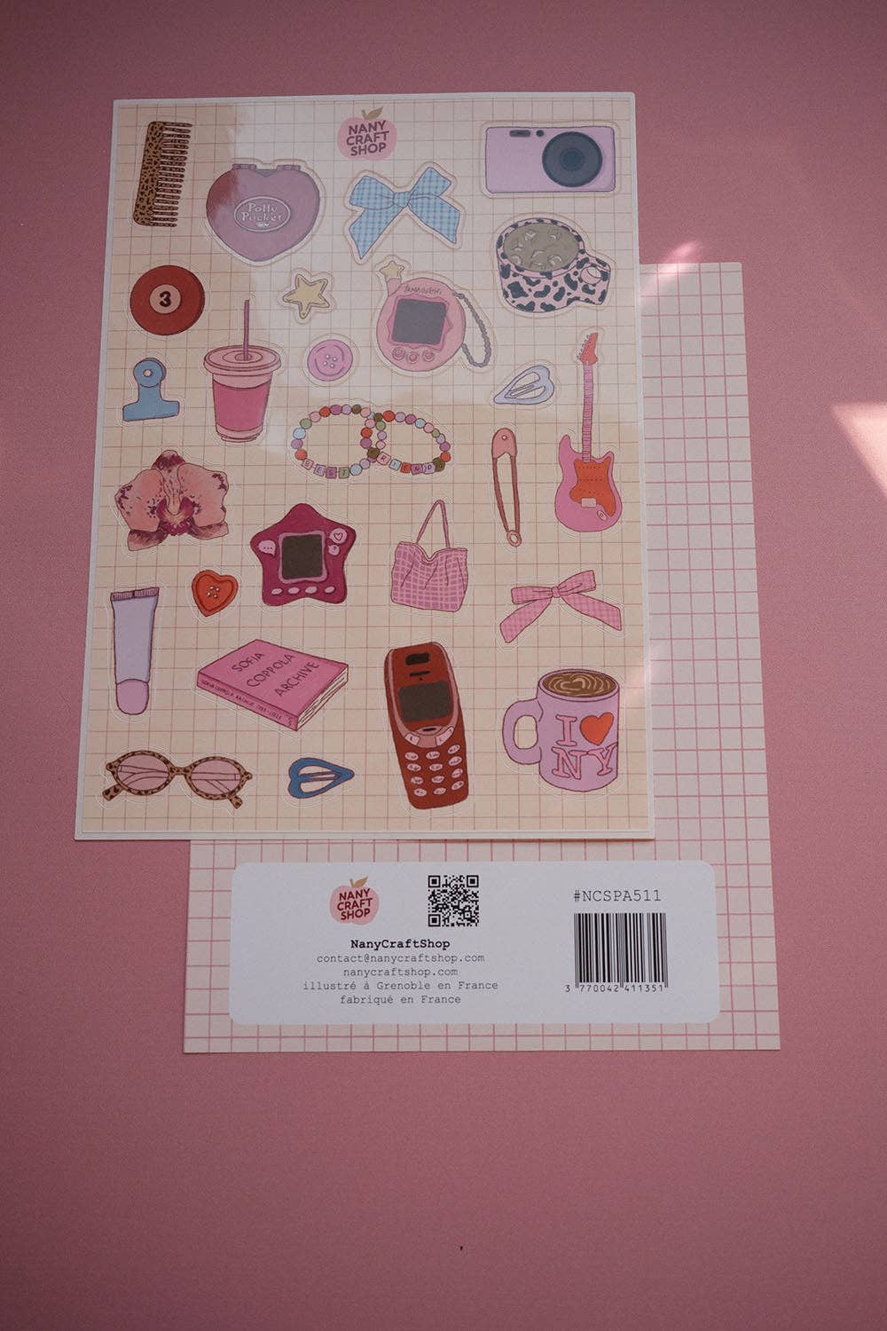 A5 sticker sheet with retro icons: camera, heart, phone, guitar, bags, beads