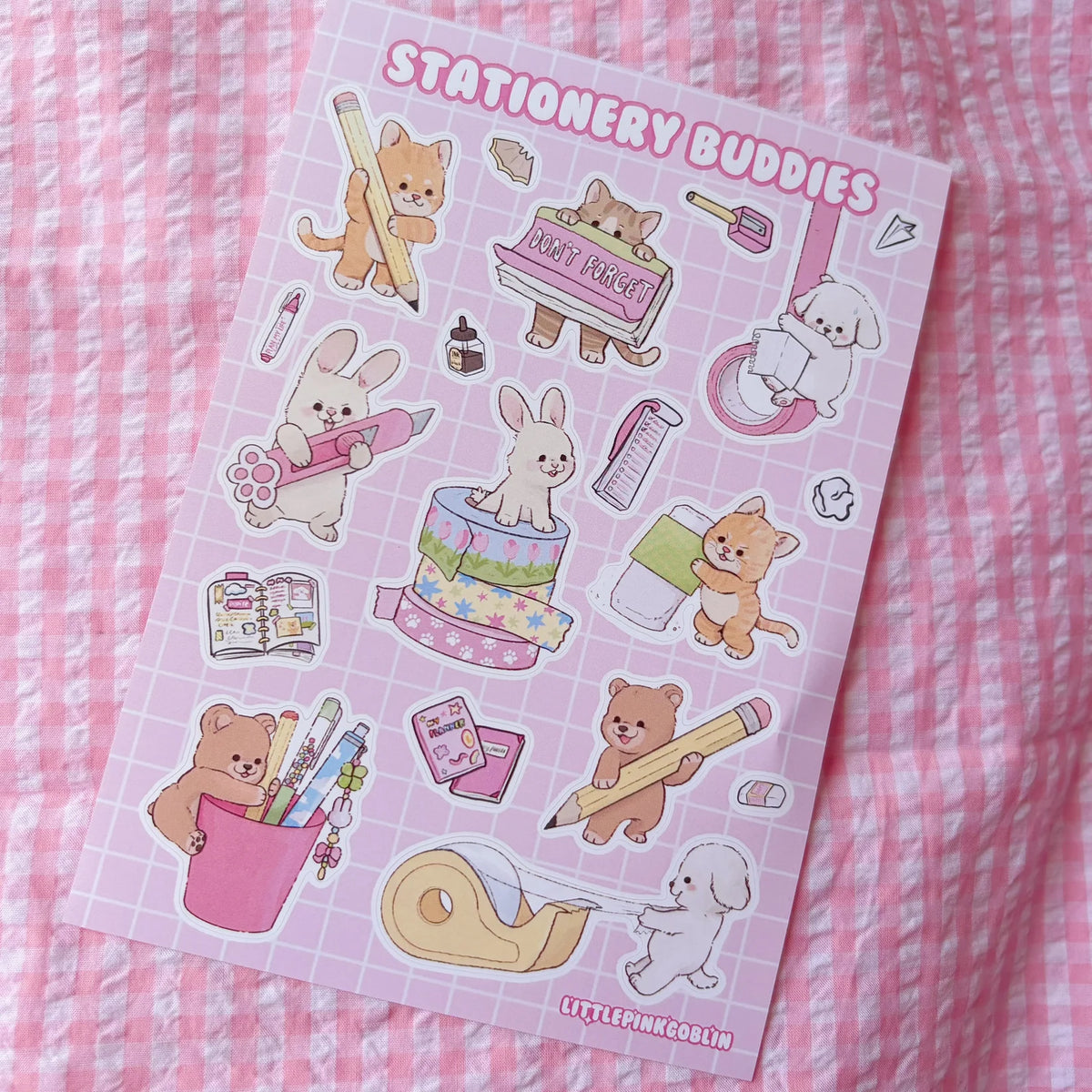 Sticker sheet with pink purple layout featuring rabbits, bear, pencils, notebooks, and heart icons