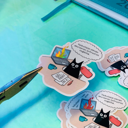 Vinyl sticker: black cat by a flaming laptop with drink and note speech bubbles