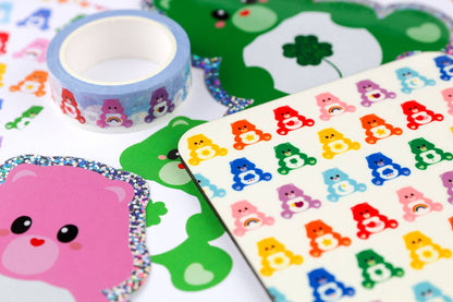 Pink care bear rainbow glitter sticker beside colorful animal sticker sheets