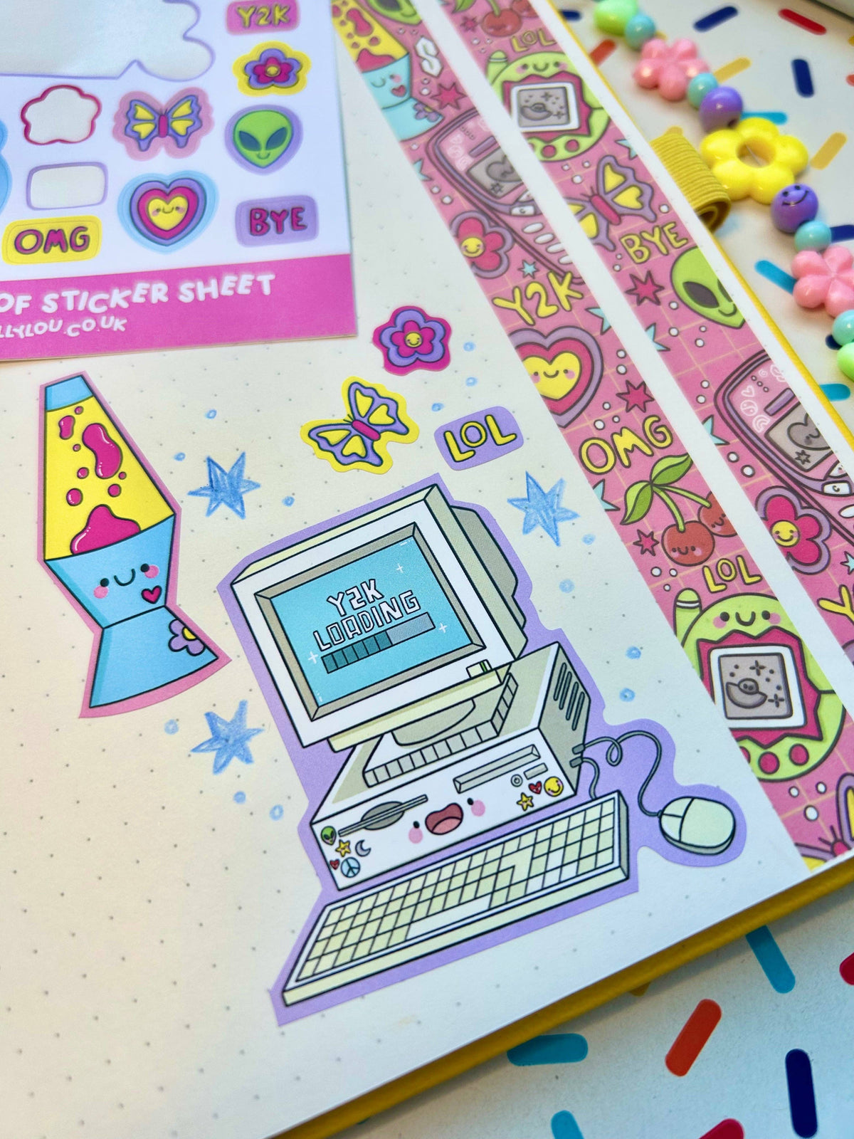 Vinyl sticker sheet with computer, phone, lava lamp, stars, hearts, cherries, LOL text