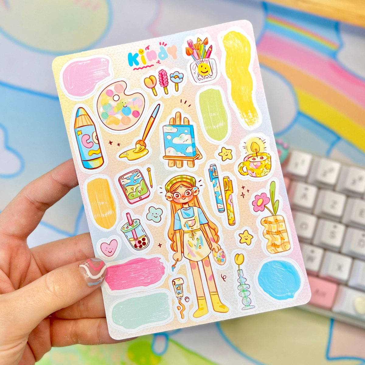Kids sticker sheet close-up with cartoon artist girl, paint palette, and paintbrushes