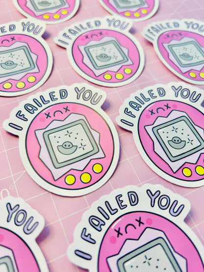Vinyl sticker sheet with multiple pink “FAILED YOU” game console characters