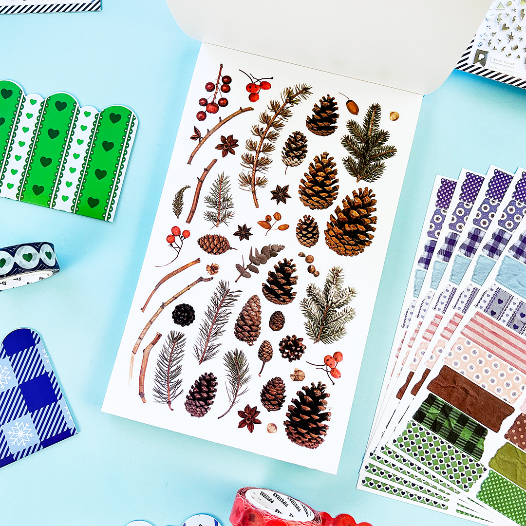 Winter nature sticker sheet with pine branches, pinecones, berries, and sprigs