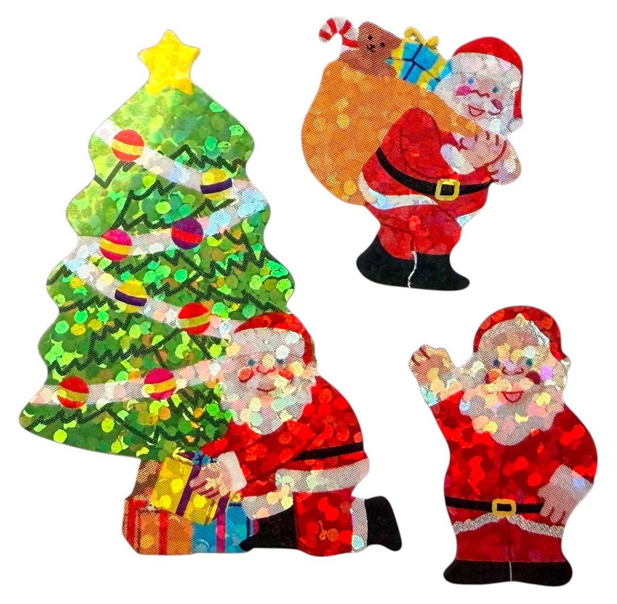 Assorted Christmas sparkle stickers featuring a decorated green tree and Santa figures