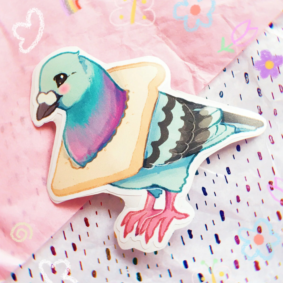 Vinyl pigeon sticker with pastel blue head and purple beak, on white border