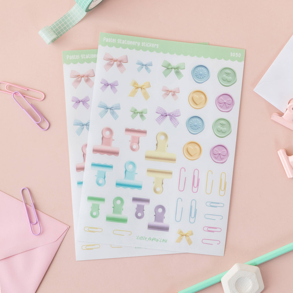 Pastel transparent waterproof sticker sheet with bows, clips, and charm shapes