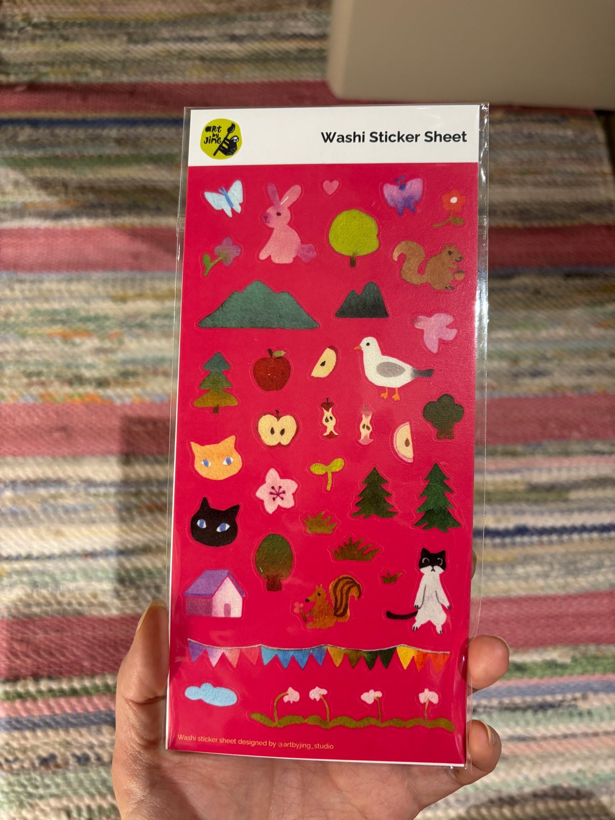 Washi sticker sheet with butterflies, rabbits, cats, trees, and flowers