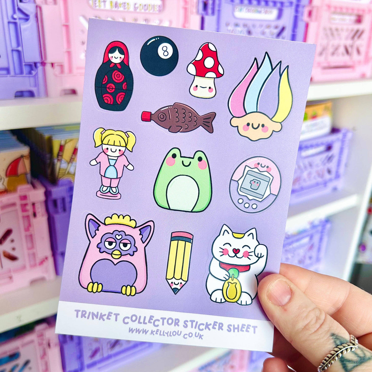 Vinyl sticker sheet with cartoon characters: cat, penguin, girl, mushrooms, fish.