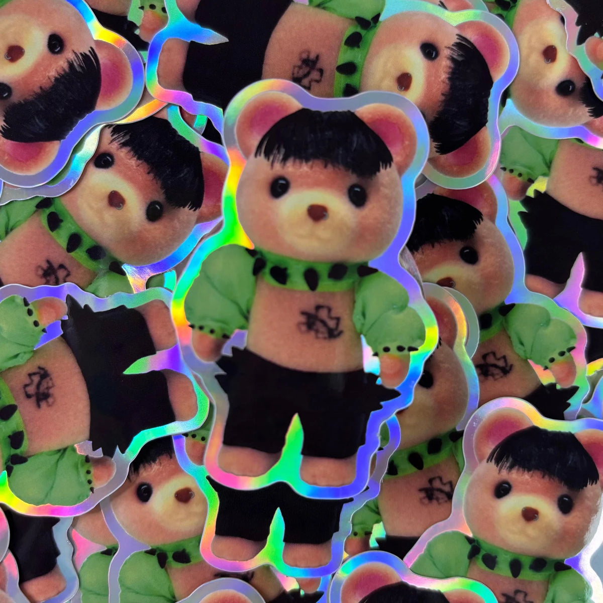 Large vinyl sticker of cute cartoon animal in green hoodie and black pants, holographic border
