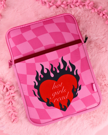 Pink checkered e-reader sleeve with zip, flame-heart logo on front